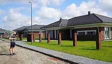 Čerpiniai stogai gyvenamųjų namų kvartale Panevėžyje