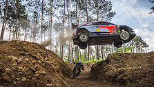WRC car vs bicycle