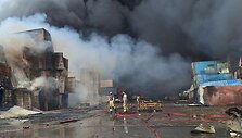 Gesimas gaisras po sprogimo &Scaron;ahid Radžajo uoste / MEYSAM MIRSADEH / AFP