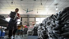 Prekės Kinijoje / JADE GAO / AFP