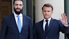 Ahmedas al Sharaa ir Emmanuelis Macronas / LUDOVIC MARIN / AFP