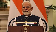 Narendra Modi / Altaf Hussain / REUTERS