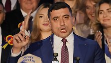 George Simionas / Vadim Ghirda / AP