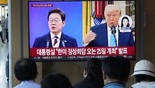 Lee Jae-myungas ir Donaldas Trumpas / Ahn Young-joon / AP