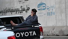 Pokalbis telefonu Kabule / WAKIL KOHSAR / AFP