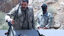 PKK atiduoda ginklus / SHWAN MOHAMMED / AFP