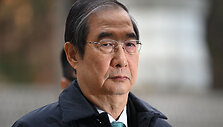 Han Duck-soo / JUNG YEON-JE / AFP