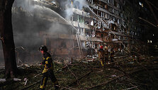 Rusijos smūgių Kyjive padariniai / GENYA SAVILOV / AFP