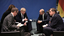Borisas Johnsonas ir Vladimiras Putinas