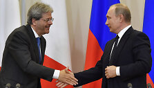 Paolo Gentiloni ir Vladimiras Putinas Sočyje