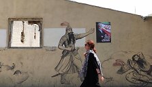 Kandidato į prezidentus Masoudo Pezeshkiano plakatas Teherane. / Majid Asgaripour / via REUTERS