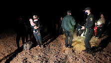 Latvijos pareigūnų sulaikyti migrantai