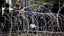I&scaron; Rūdninkų migrantų stovyklos (&Scaron;alčininkų r.) gyventojai i&scaron;keliami į Kybartų (Vilkavi&scaron;kio r.) užsieniečių registracijos centrą