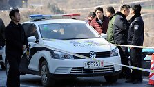 Kinijos policija vietoje, kur nuo skardžio nulėkė autobusas