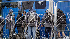 I&scaron; Rūdninkų migrantų stovyklos (&Scaron;alčininkų r.) gyventojai i&scaron;keliami į Kybartų (Vilkavi&scaron;kio r.) užsieniečių registracijos centrą