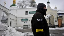 SBU pareigūnas / SERGEI CHUZAVKOV / AFP