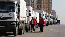 JT Humanitarinės pagalbos konvojus vyksta i&scaron; Damasko į kitus regionus