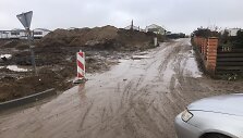 Romaini&scaron;kių gatvė Kaune virto purvynu