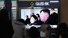 &Scaron;iaurės Korėjos lyderis Kim Jong Unas su dukra
