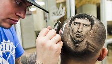 Ant pakau&scaron;io i&scaron;skutinėtas Lionelio Messi portretas 