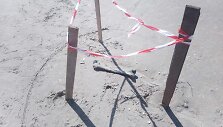 Poilsiautojai paplūdimyje aptiko kaulą. I&scaron;kviesti policijos pareigūnai.