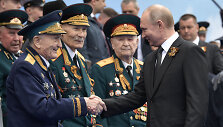 V.Putinas ir karo veteranai