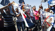 Gazos Ruože palestiniečiai protestuoja prie&scaron; JAV Artimųjų Rytų ekonomikos planą