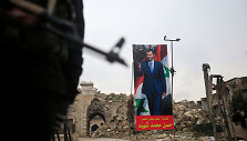 Basharo al Assado plakatas