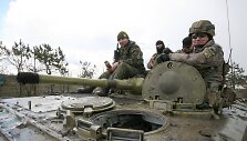 Ukrainos kariai prie&scaron;akinėje fronto linijoje.