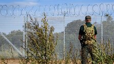 Latvijos pasienietis / GINTS IVUSKANS / AFP