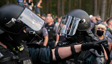 Gyventojų susirėmimas su policijos pareigūnais prie Rūdninkų poligono
