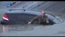 reporter-saves-driver-from-sinking-car