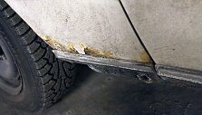 Surūdijusi automobilio detalė
