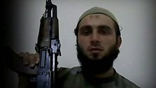 Burakas Karanas su ginklu