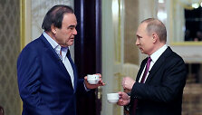 Oliveris Stone'as ir Vladimiras Putinas