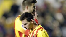 Gerardas Pique ir Lioneliis Messi