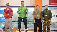 Du lietuviai ant nugalėtojų pakylos: 1 vt. Ričardas Ivanovas; 3 vt. Brendonas Kuodis