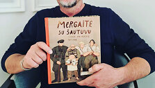 Ra&scaron;ytojas su knyga