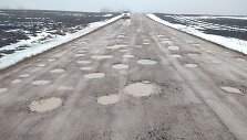 Kelias netoli Žygaičių, juo kasdien į mokyklą važiuoja mokyklinis autobusas.