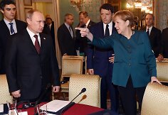 Vladimiras Putinas ir Angela Merkel