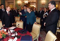 Vladimiras Putinas, Angela Merkel ir Petro Poro&scaron;enka