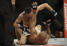 Jose Aldo ir Maxas Holloway