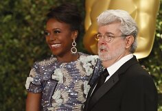 Režisierius George'as Lucasas su žmona Mellody Hobson