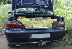 Cigaretės automobilio bagažinėje