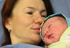 Septyniamilijardasis pasaulio žmogus, jo mama Jelena Nikolajeva