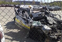Saugos tarnybos automobilis po avarijos.