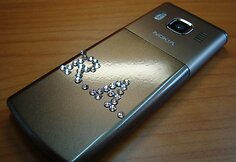 „Antra oda“ aptrauktas telefonas.