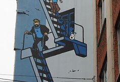 Komiksai &ndash; belgų kultūros dalis (pavaizduotas Tintinas su &scaron;unimi Sniegeliu)