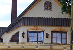 Pasakų namelį primenantis plungi&scaron;kio būstas kausto praeivių žvilgsnius
