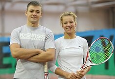 Treneris Arūnas Balžekas ir Akvilė Paražinskaitė